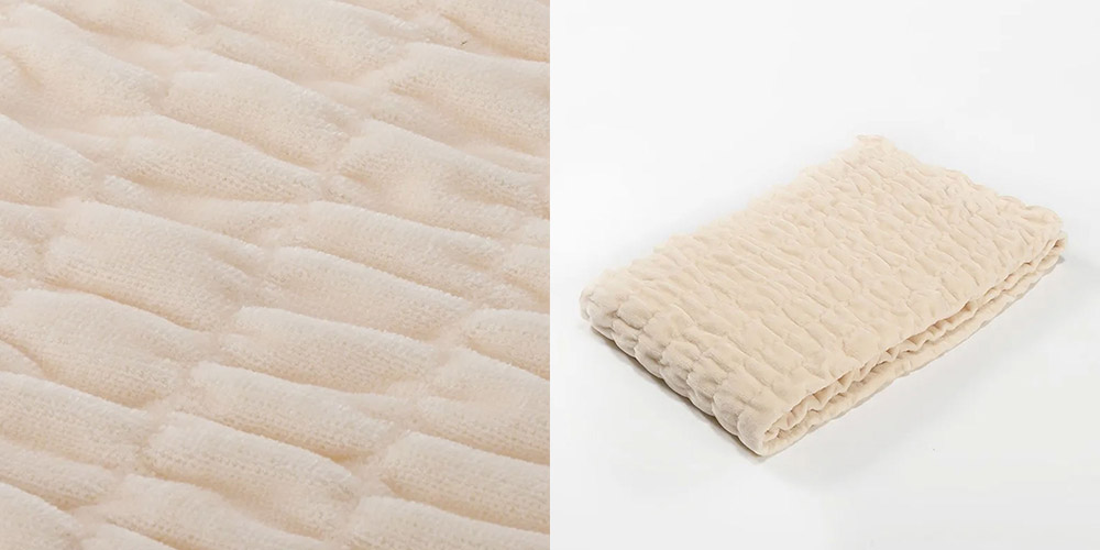 「newmine（ニューミン）」シルク混ブランケットのピンク色