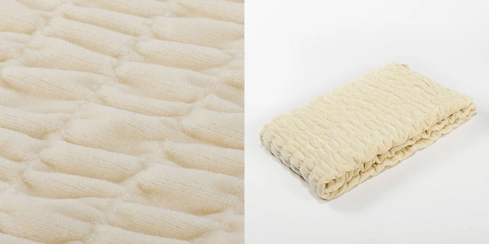 「newmine（ニューミン）」シルク混ブランケットのアイボリー色