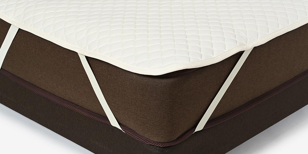 ウォッシャブル羊毛ベッドパッド「アニバ2」のずれ防止のゴムイメージ